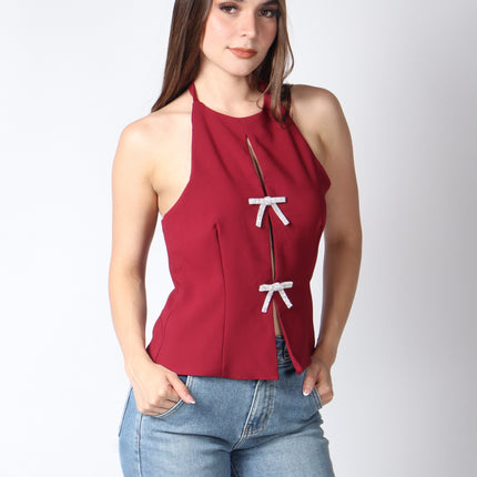 Blusa cuello halter con moños.