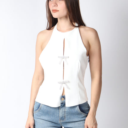 Blusa cuello halter con moños.