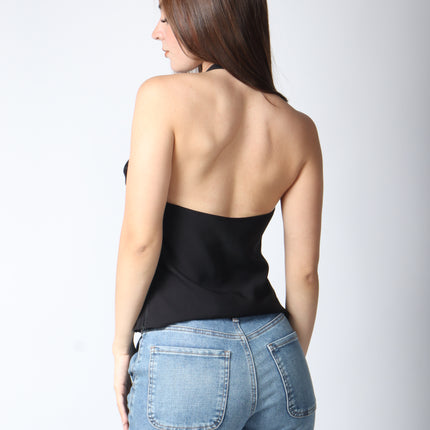 Blusa cuello halter con moños.